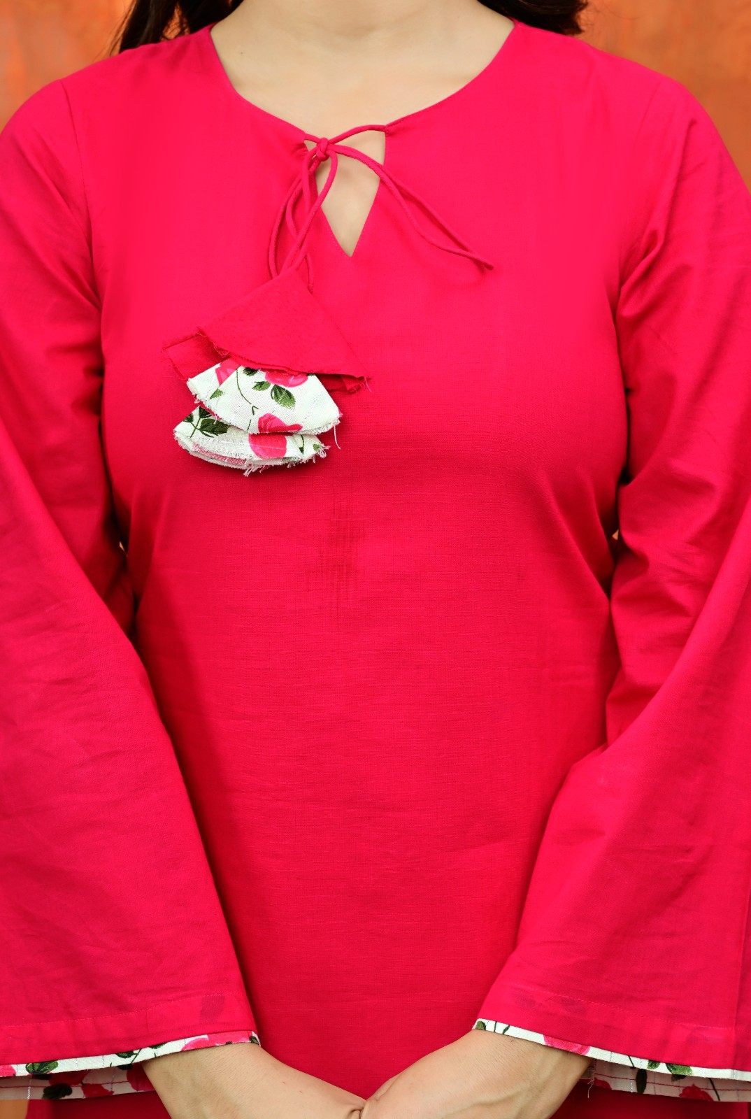 Pink Kurti with Matching Fabric Latkan & Off-White Floral Printed Salwar Set