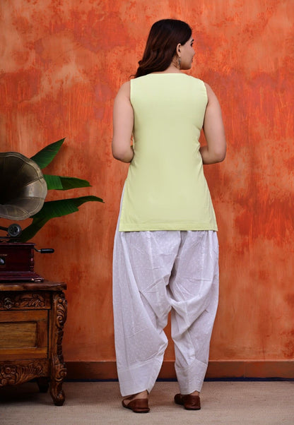 Green Cotton Kurti with Notched Neck Paired with White Patiala Salwar