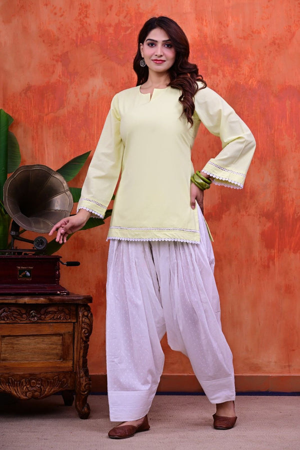Women Plain Lime Cotton Short Kurti with Flared Sleeves Paired with  White Patiala Salwar