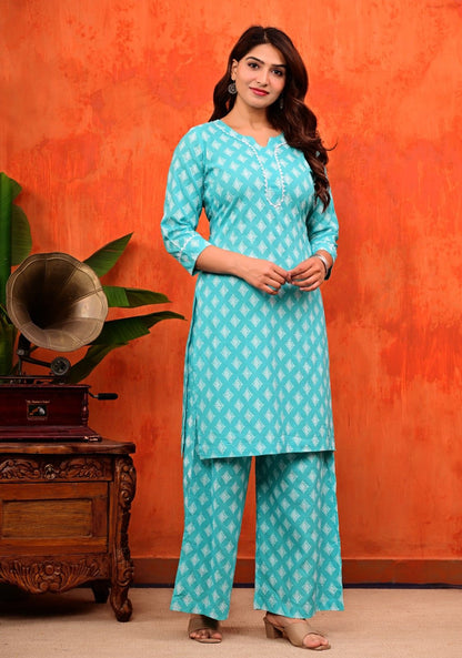 Turquoise Blue Pure Cotton Printed Kurti and Flared Palazzo Suit