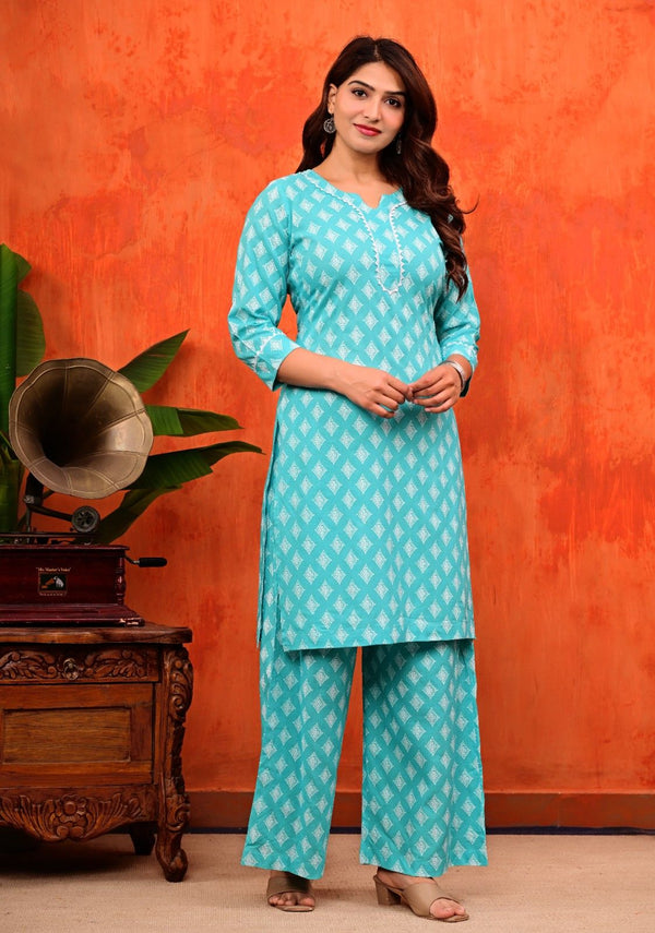 Turquoise Blue Pure Cotton Printed Kurti and Flared Palazzo Suit